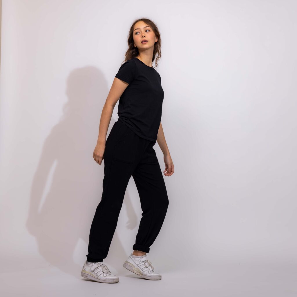 Fashion Photography - Women in All Black T Shirt and Cambric pants