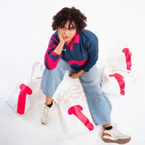 Model with shopping bags.