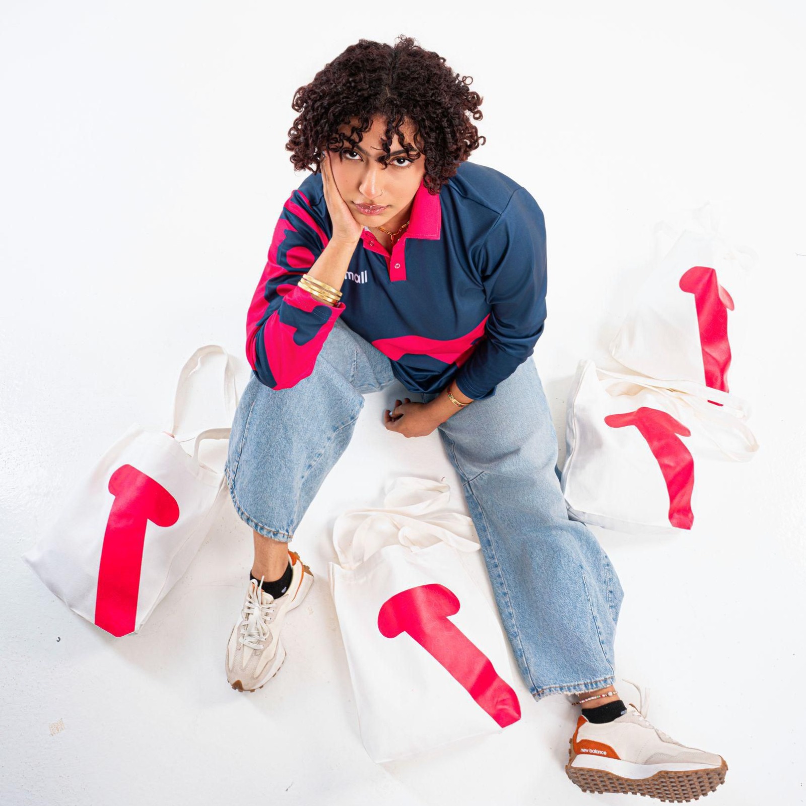 Model with shopping bags.