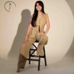 Fashion model in co-ord set with sneakers