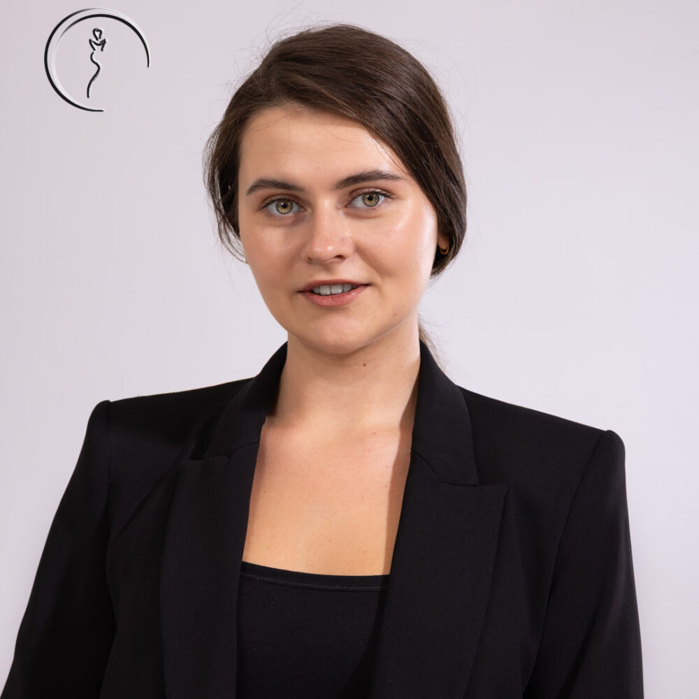 Professional female model posing at a studio