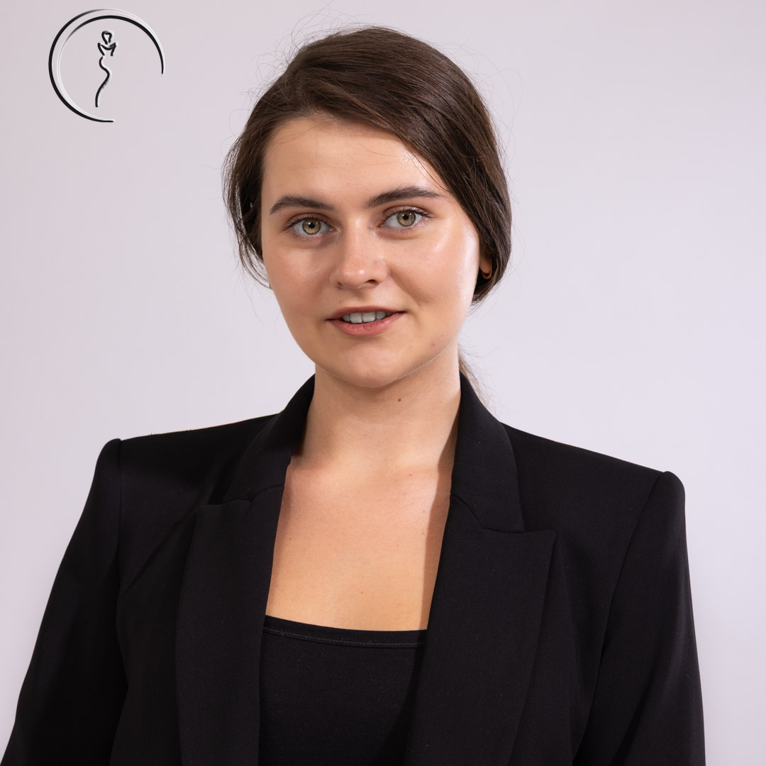 Professional female model posing at a studio
