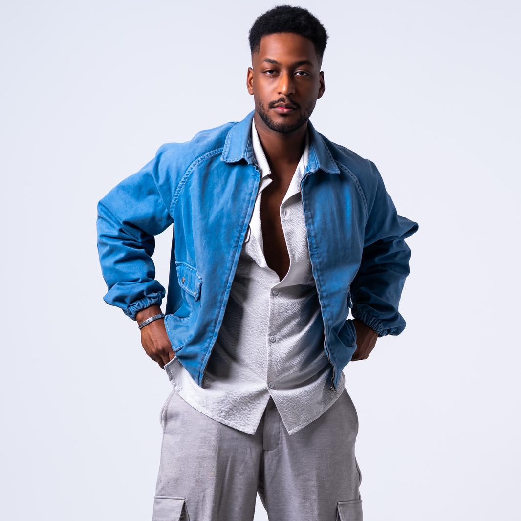 Kuwaiti male model in modern casual wear posing in a studio