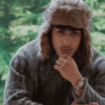 Close-up portrait of male model in winter outfit