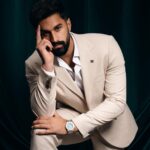 Stylish man posing in suit