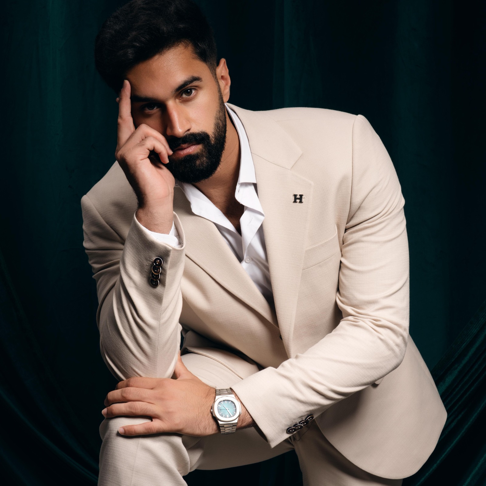 Stylish man posing in suit