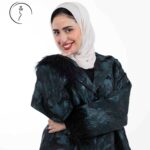 Kuwaiti hijabi model in modest dress posing in a studio