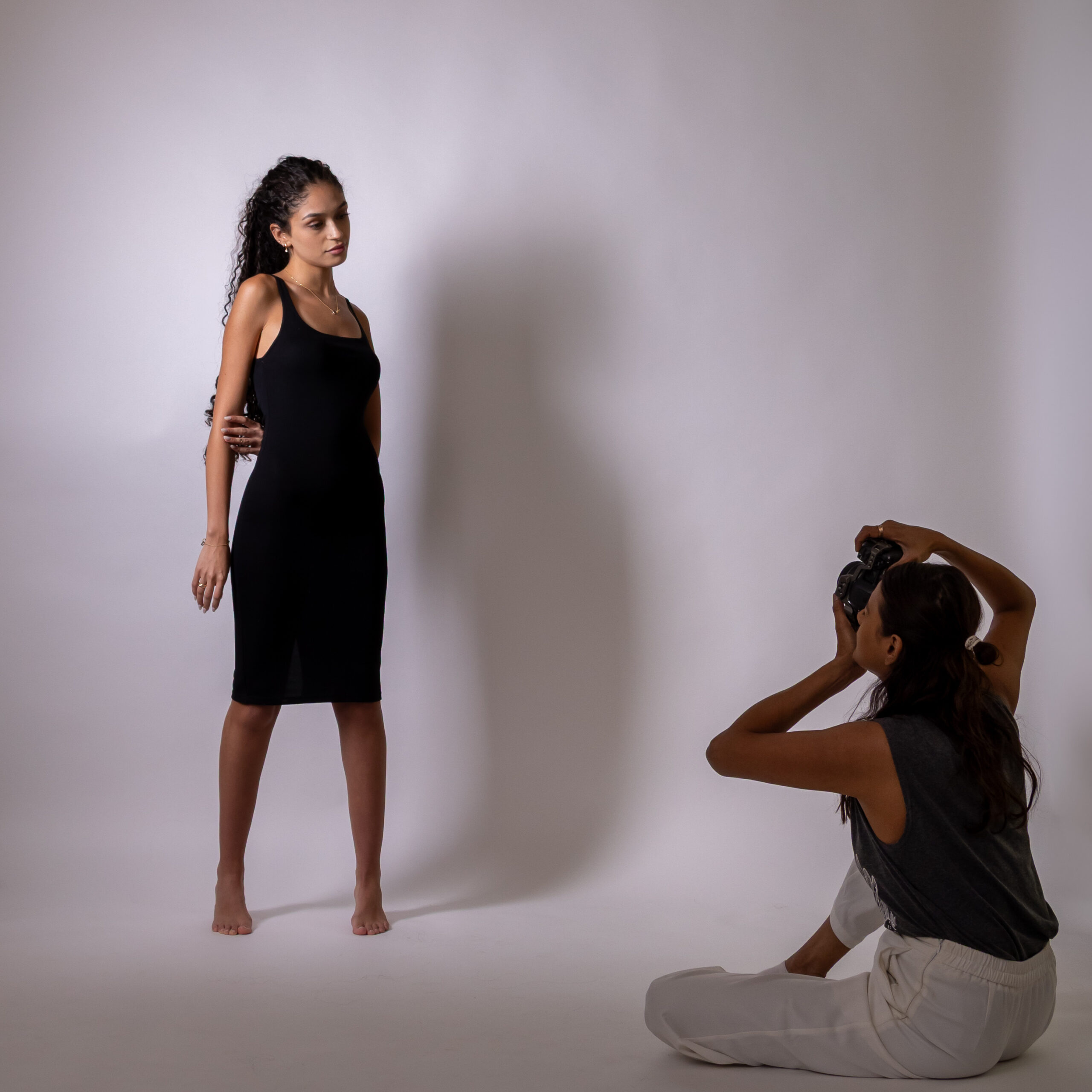 Female photographer in Kuwait offering fashion shoots, BTS coverage, and portfolio creation.