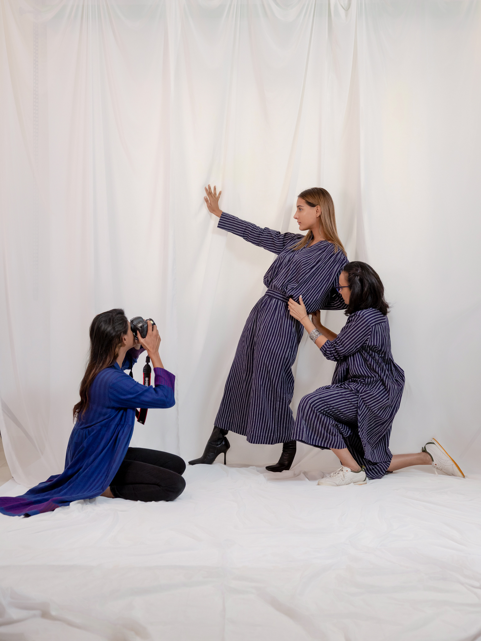 Female photographer in Kuwait specializing in high-end fashion photography and editorial shoots.